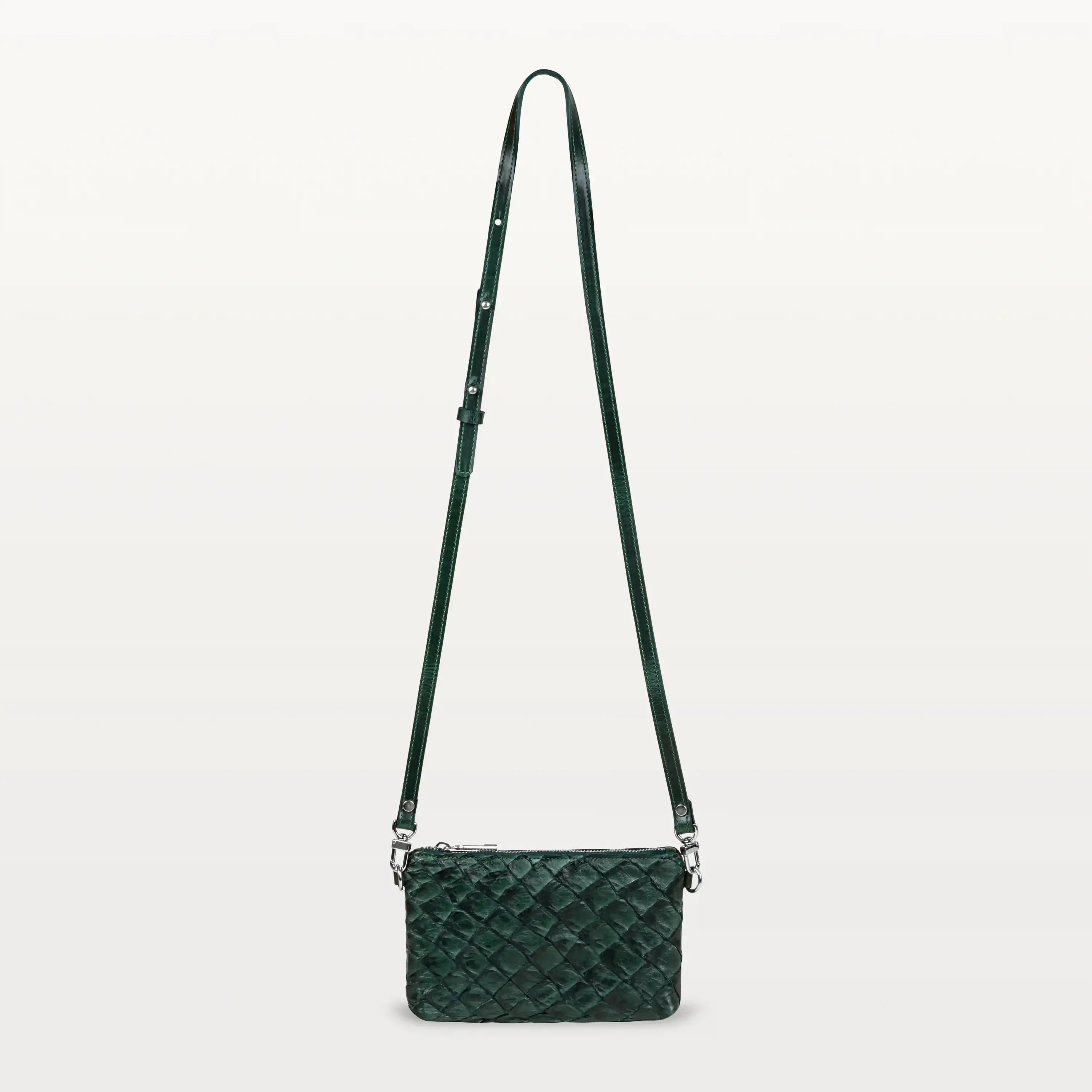 Small rectangular verdant green crossbody bag made of textured sustainable Pirarucu fish leather with long crossbody strap