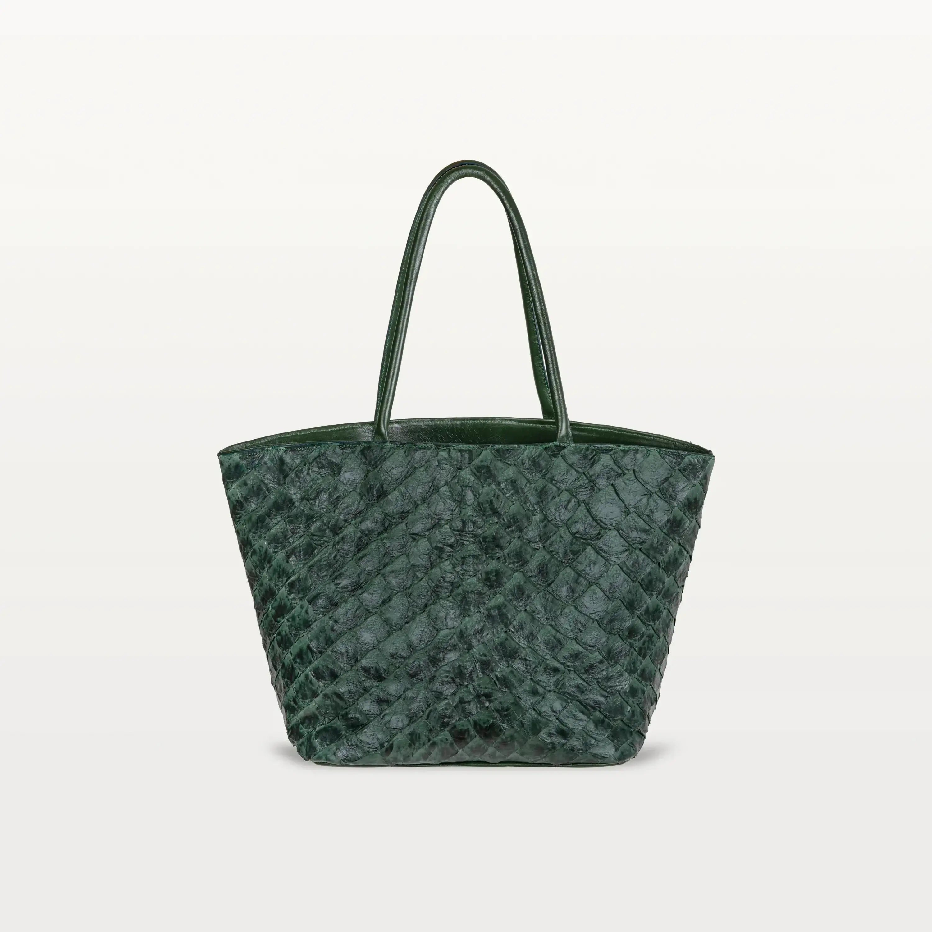 The Delray Shopper in verdant green pirarucu leather, a large tote bag with a unique fish scale texture and two top handles.