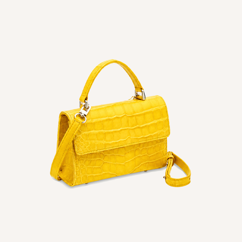 sustainable luxury handbag in canary yellow alligator from piper & skye
