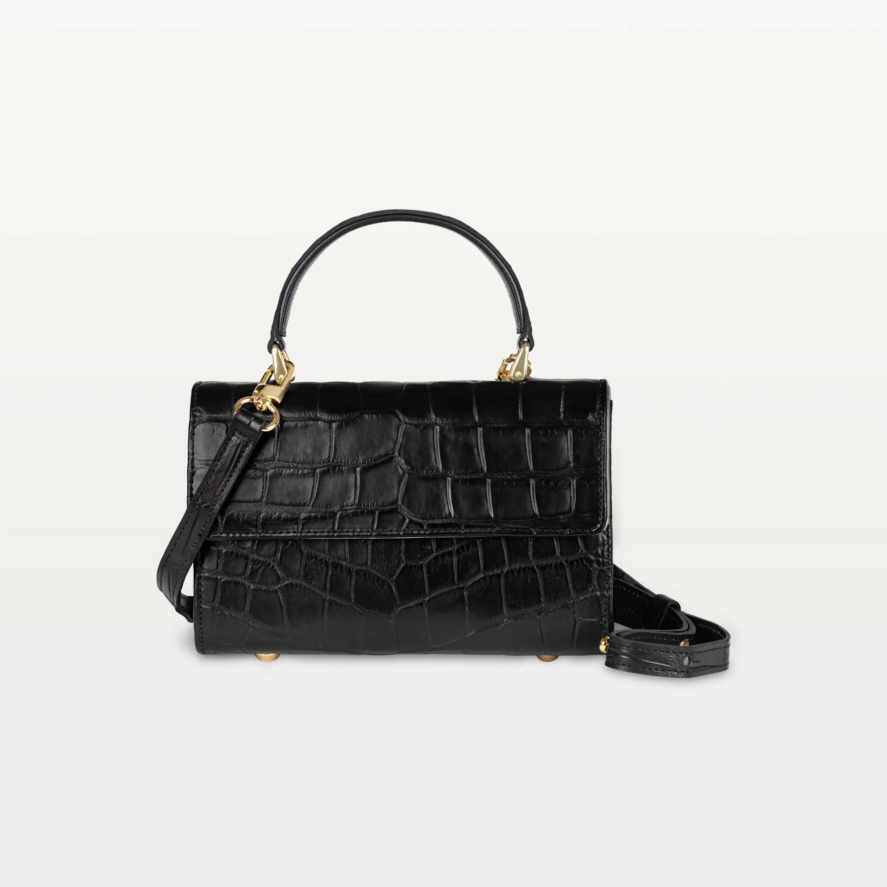 The structured black Soho top handle bag in glossy black alligator leather with a curved top handle, crossbody strap and gold hardware.