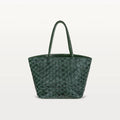 The Delray Shopper in verdant green pirarucu leather, a large tote bag with a unique fish scale texture and two top handles. 