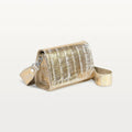 Side view of metallic gold Lola crossbody bag in alligator with thick detachable strap and silver hardware