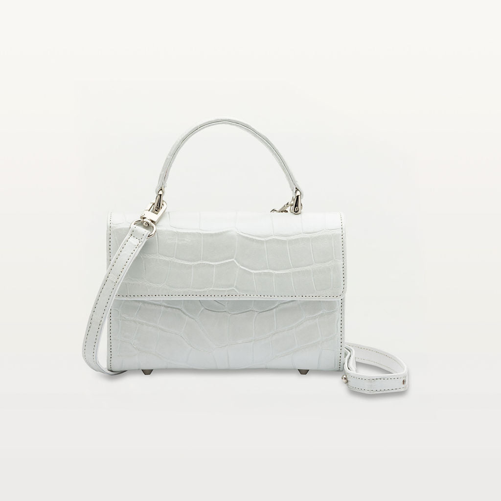 Piper & Skye's sustainable leather Soho Top Handle handbag in Moonstone White wild american alligator.