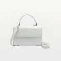 Piper & Skye's sustainable leather Soho Top Handle handbag in Moonstone White wild american alligator.